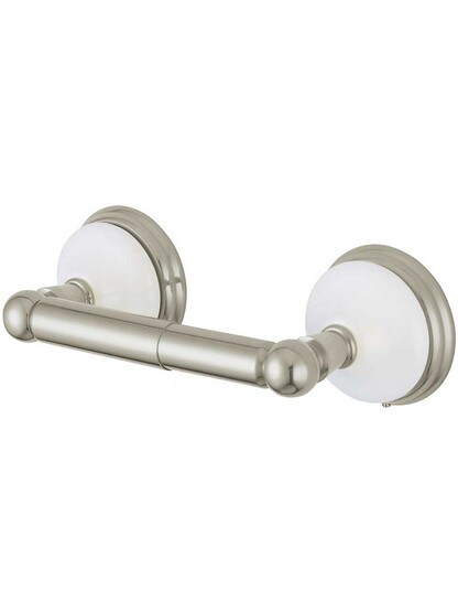 Cumberland Toilet Paper Holder with Brass and White Porcelain Rosettes in Satin Nickel.